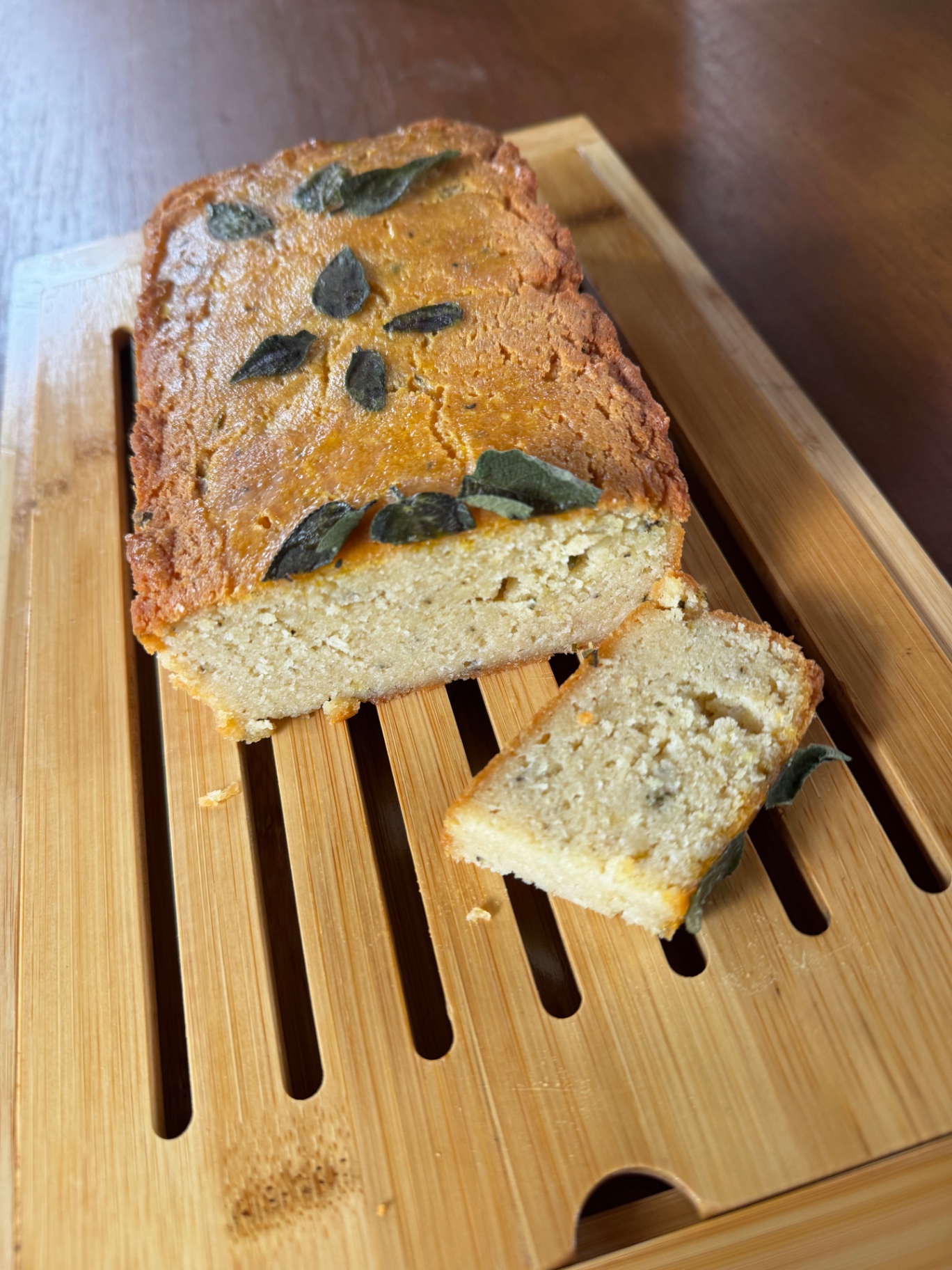 House-baked sage bread on a wooden board