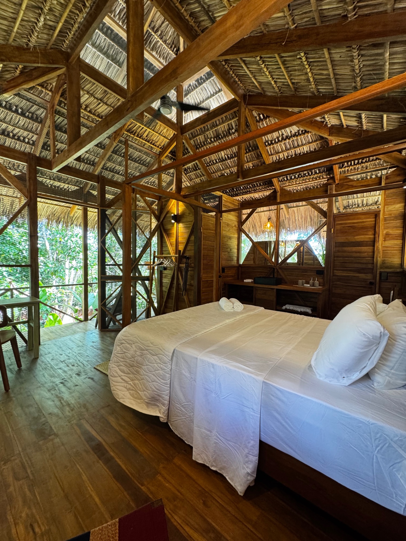 Interior of the wooden academy house with double bed