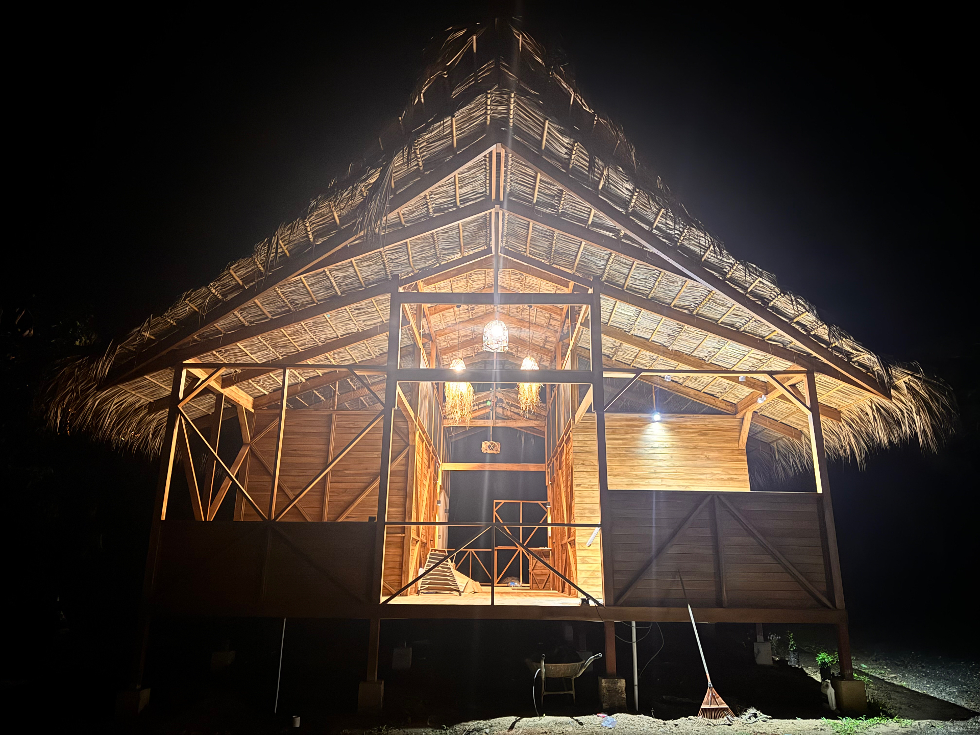 The lodge glowing under the night sky
